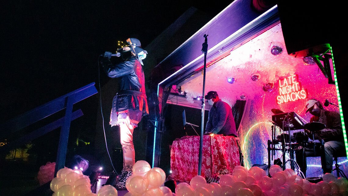 Person on stage with microphone