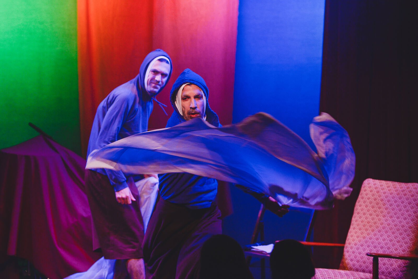 two people performing in theatre